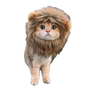 Cat wearing a lion costume standing on a tree branch in a park