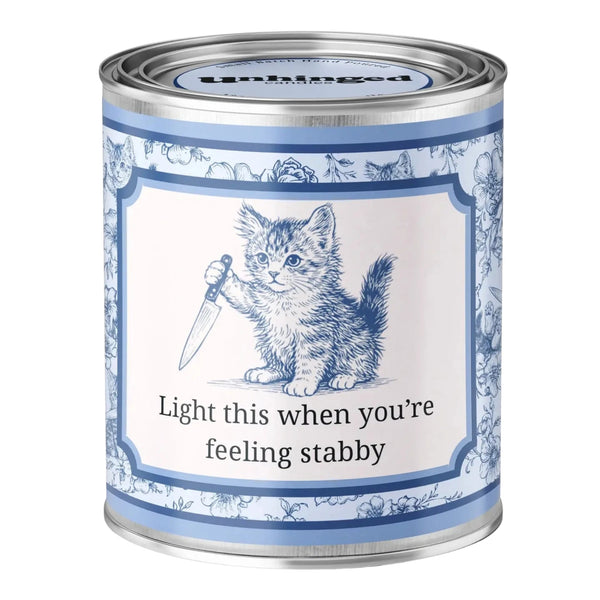 Unhinged Candles Light This When You're Feeling Stabby soy candle in a blue toile paint can with a kitten holding a knife